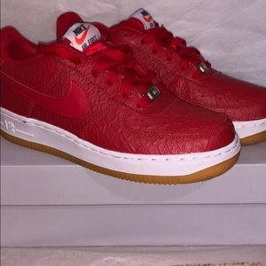 Red snake skin Air Force 1s.